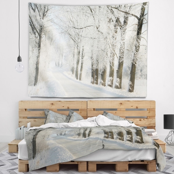 Designart 'Winter Rural Road Among Frosted Trees' Forest Wall Tapestry