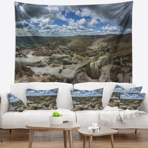 Designart 'Clouds and Stones under Wild Clouds' Landscape Wall Tapestry