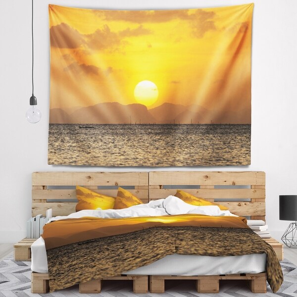 Designart 'Yellow Sunset and Brown Ocean' Seashore Wall Tapestry