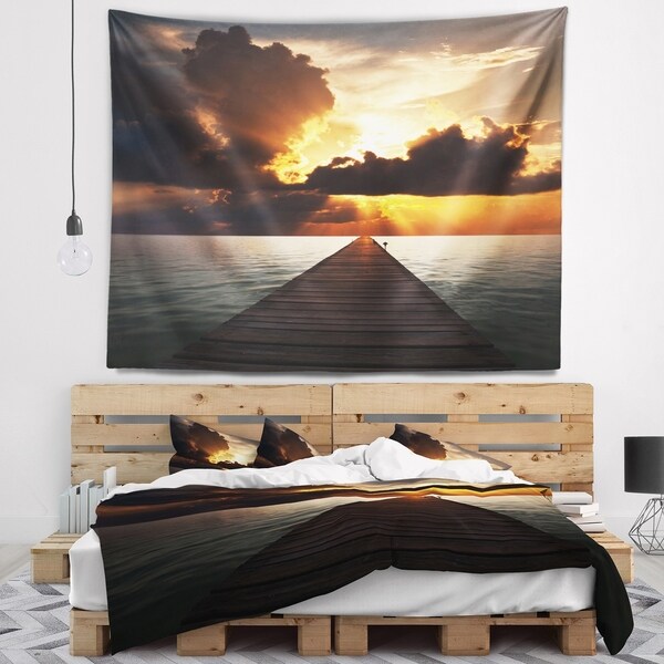 Designart 'Indefinite Wooden Pier to Gloomy Sea' Bridge Wall Tapestry