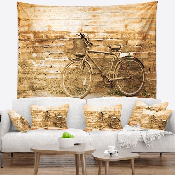 Designart 'Vintage Bicycle against Brown Wall' Landscape Wall Tapestry