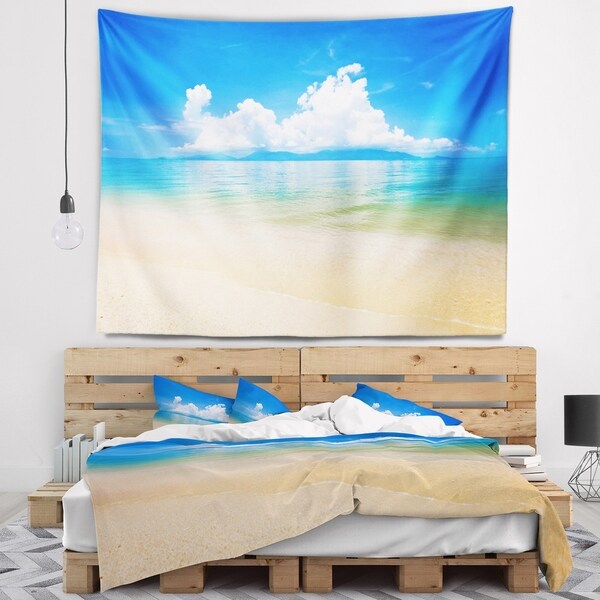 Designart 'Cloudy Horizon Over Blue Sea' Seashore Photo Wall Tapestry