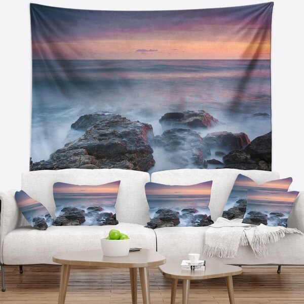 Designart 'Blue Rocky Sea Beach Sunset' Modern Landscape Wall Tapestry