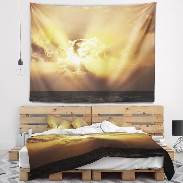 Designart 'Majestic Sea Sunset Through Clouds' Landscape Wall Wall Tapestry