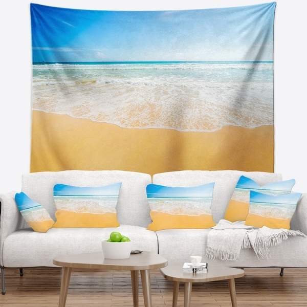 Designart 'Long Waves on Sand under Blue Sky' Seascape Wall Tapestry