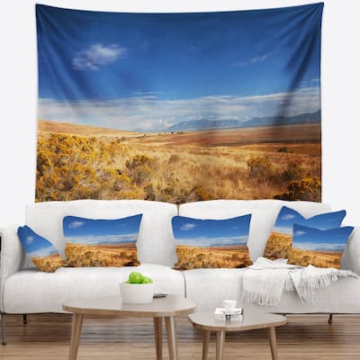 Designart 'Expansive Prairie under Blue Sky' Landscape Wall Tapestry