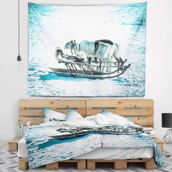 Designart 'Dogs on Reindeer Sleigh' Animal Wall Tapestry
