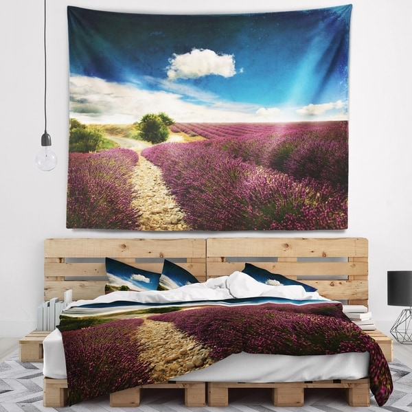 Designart 'Lavender Field with Dramatic Blue Sky' Landscape Wall Tapestry