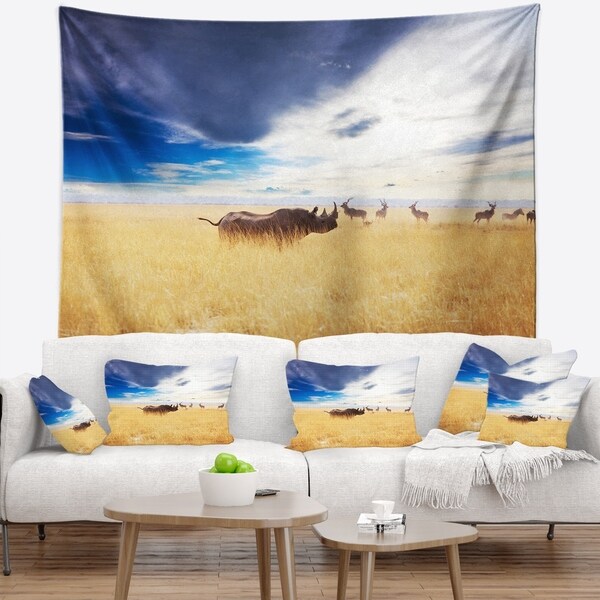 Designart 'Huge Rhino with Antelopes' Seashore Wall Tapestry
