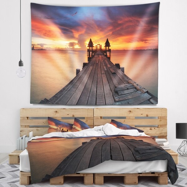 Designart 'Glowing Sky and Long Wooden Bridge' Pier Seascape Wall Tapestry