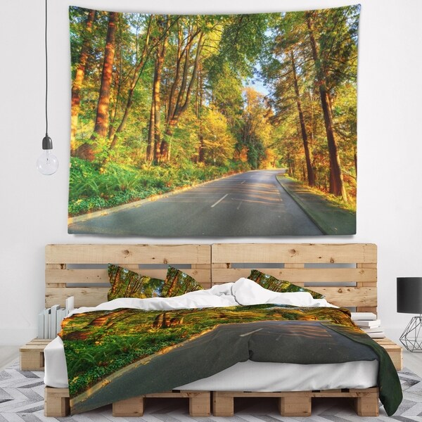 Designart 'Road Through Yellow Forest' Landscape Wall Tapestry