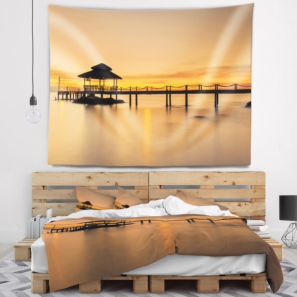Designart 'Wonderful Wooden Pier and Hut Phuket' Pier Seascape Wall Tapestry