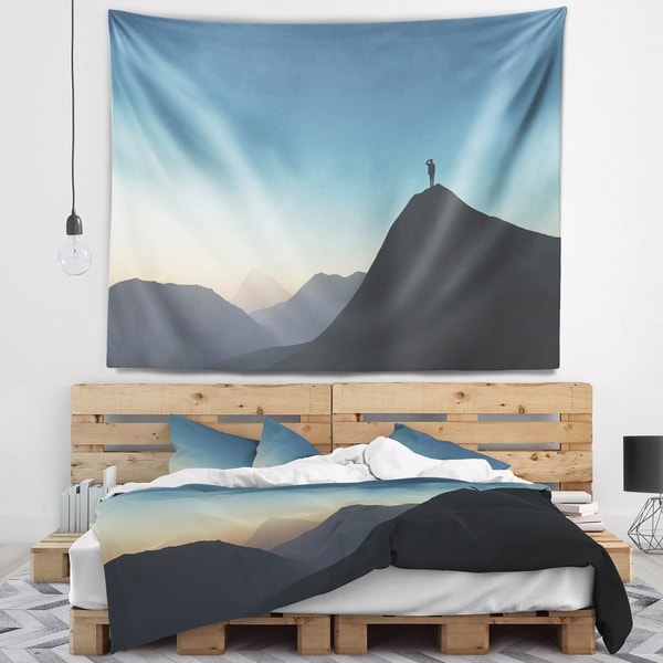 Designart 'Man Looking from Mountain' Landscape Wall Tapestry