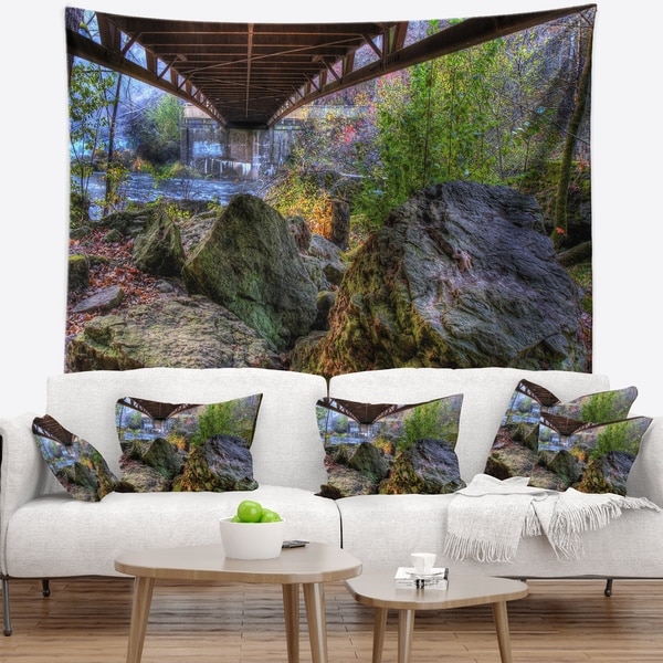 Designart 'Large Rocks Under Bridge in Creek' Landscape Photography Wall Tapestry