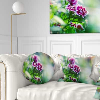 Designart 'Pink Flowers on Green Background' Floral Throw Pillow