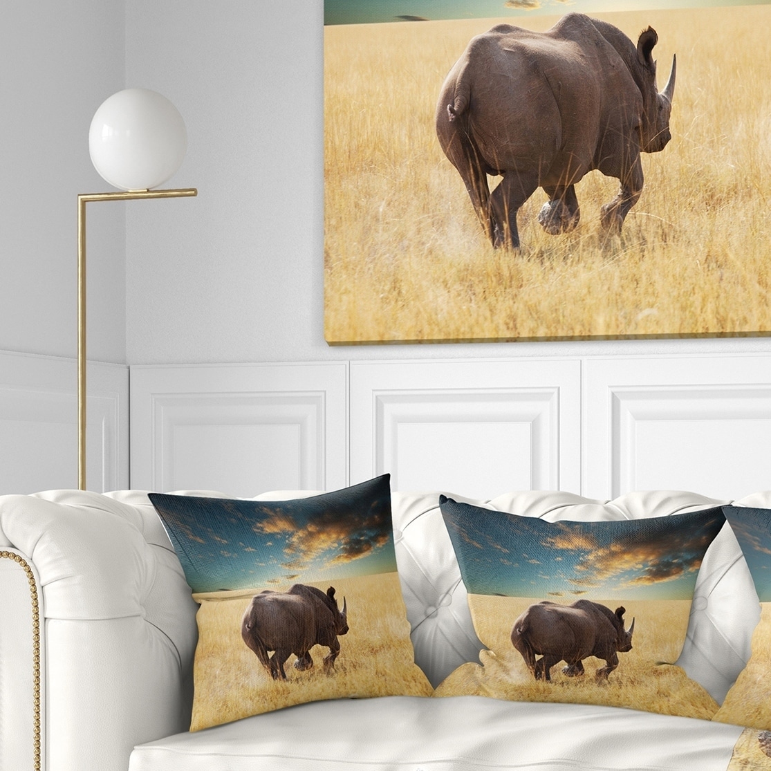 https://ak1.ostkcdn.com/images/products/20949659/Designart-Giant-Rhino-under-Cloudy-Sky-African-Throw-Pillow-f923c124-3910-4169-9462-bae6cd22347a.jpg