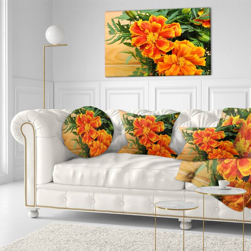 Designart 'Marigold Flower on Wooden Background' Floral Throw Pillow