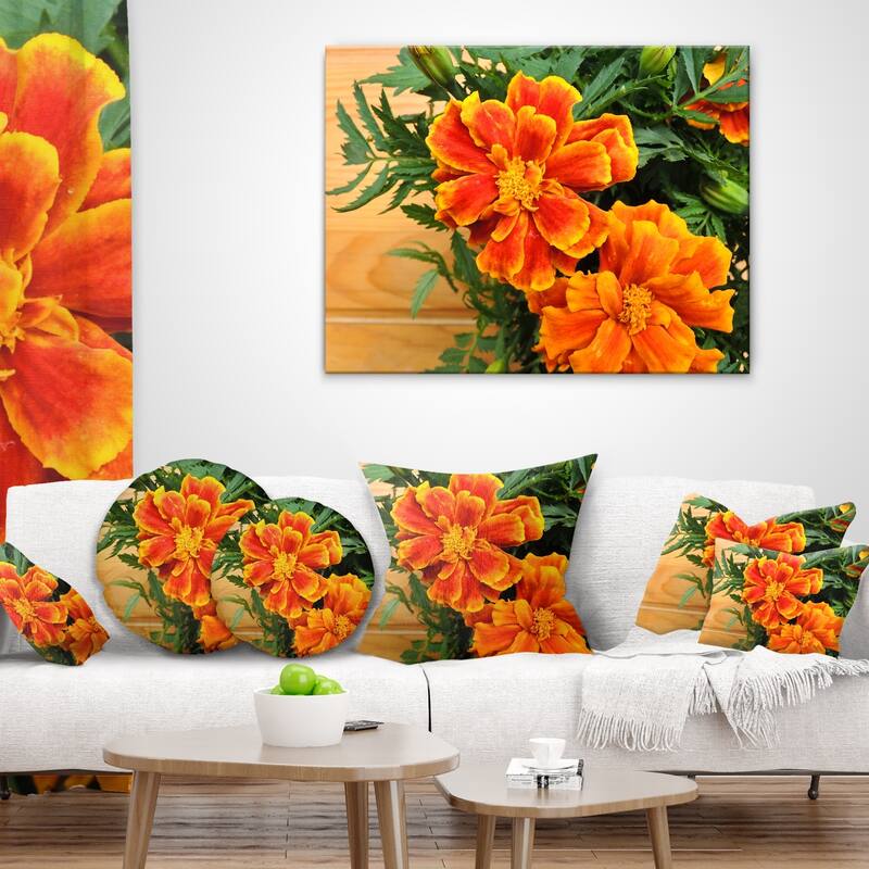 Designart 'Marigold Flower on Wooden Background' Floral Throw Pillow
