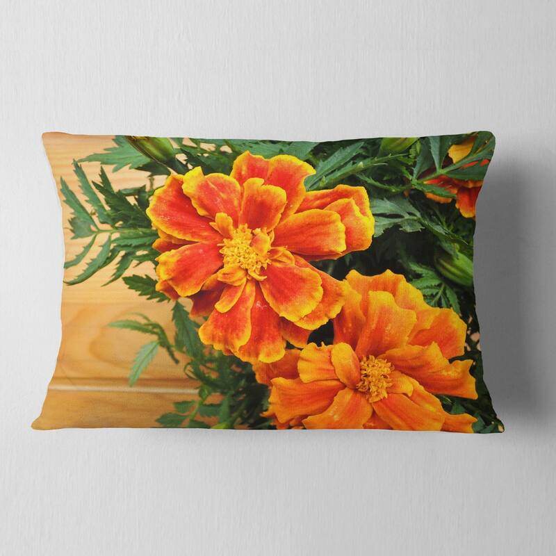 Designart 'Marigold Flower on Wooden Background' Floral Throw Pillow