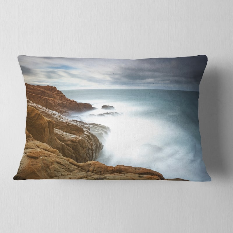 Designart 'Dark Red Rocks and Foam Waves' Seascape Throw Pillow