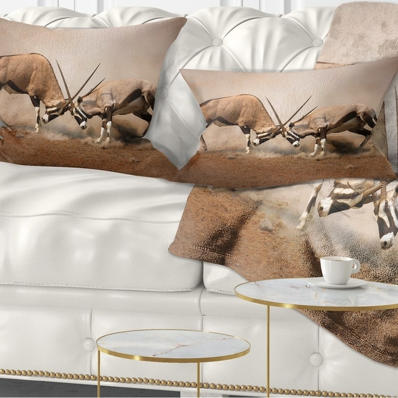Designart 'Gemsbok Antelopes Fighting' African Wall Throw Pillow - Rectangle - 12 in. x 20 in. - Medium