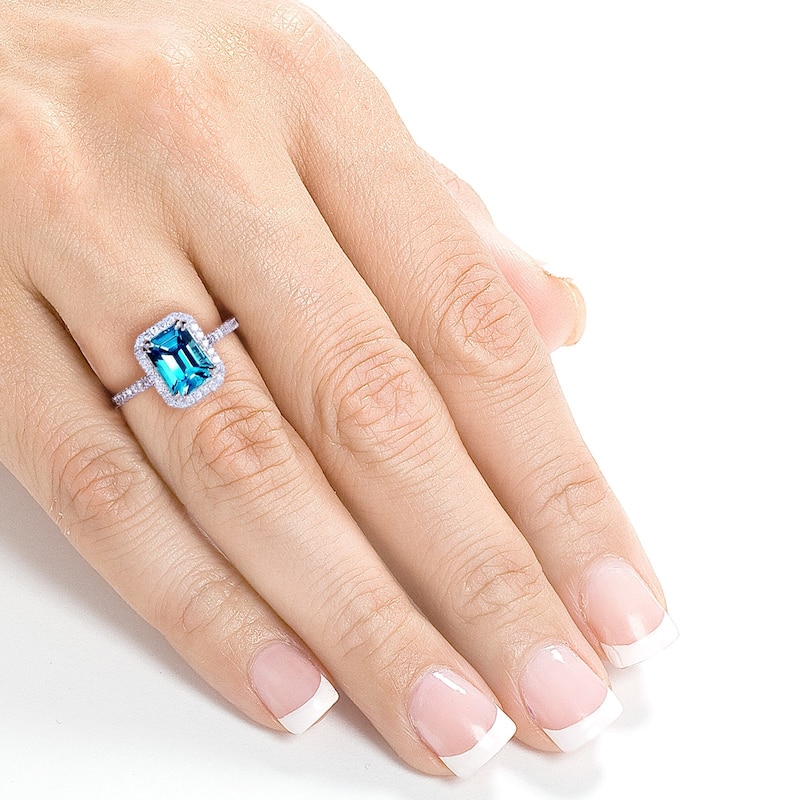 Annello by Kobelli 14k White Gold 1 3/4ct TGW Emerald Cut Swiss Blue Topaz and Diamond Halo Gemstone Ring