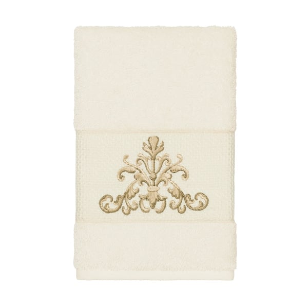 https://ak1.ostkcdn.com/images/products/21139280/Authentic-Hotel-and-Spa-Cream-Turkish-Cotton-Scrollwork-Embroidered-Hand-Towel-4547673b-cdcd-4a46-a57a-218dcc4843cc_600.jpg?impolicy=medium