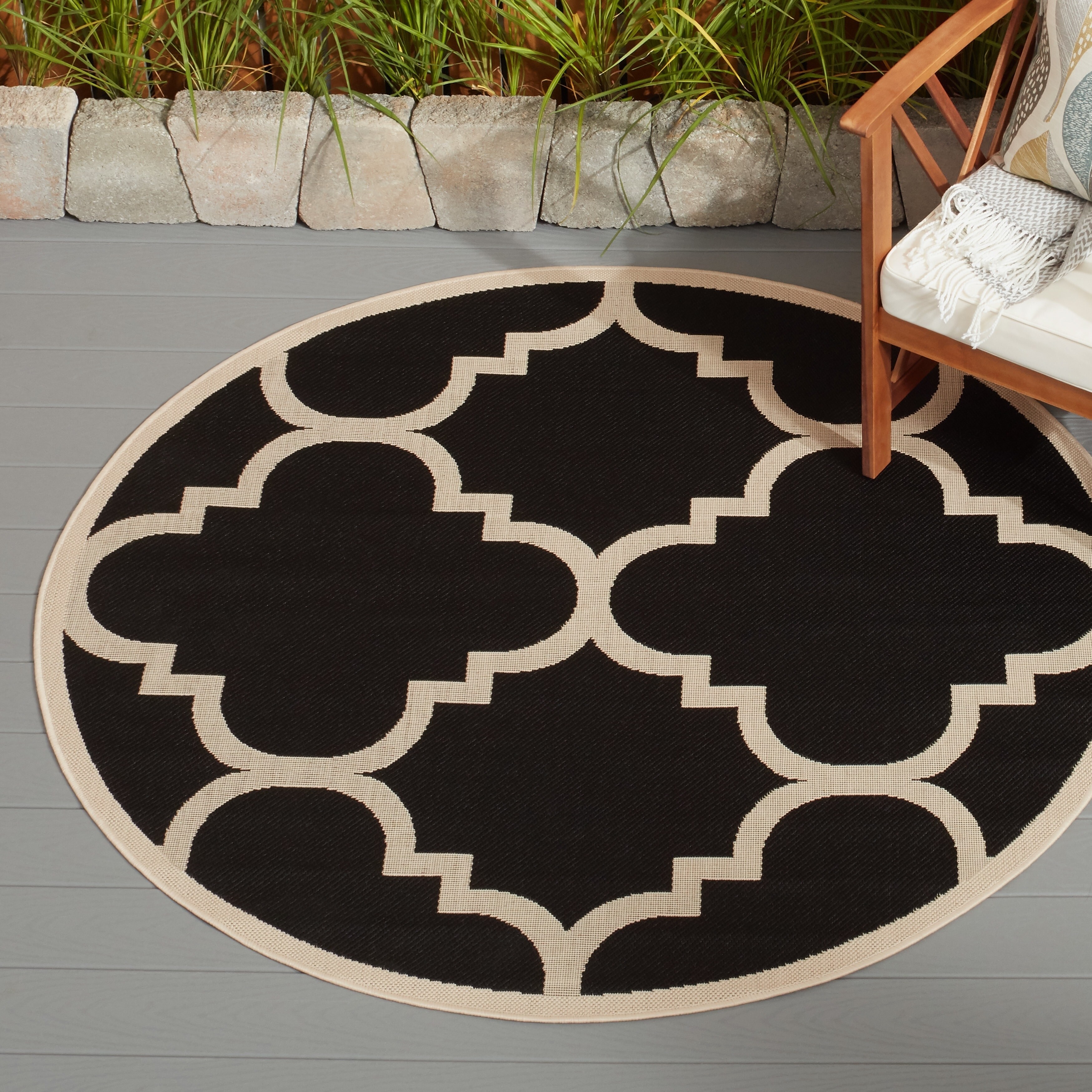 https://ak1.ostkcdn.com/images/products/21209900/Safavieh-Courtyard-Quatrefoil-Black-Beige-Indoor-Outdoor-Rug-2-x-37-3d05d9df-f5c0-43bf-ba84-f2f2e70a1e68.jpg