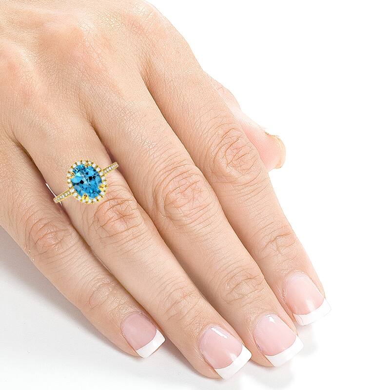Annello by Kobelli 14k Gold 2 1/4ct TGW Oval Cut Swiss Blue Topaz and Diamond Halo Gemstone Ring