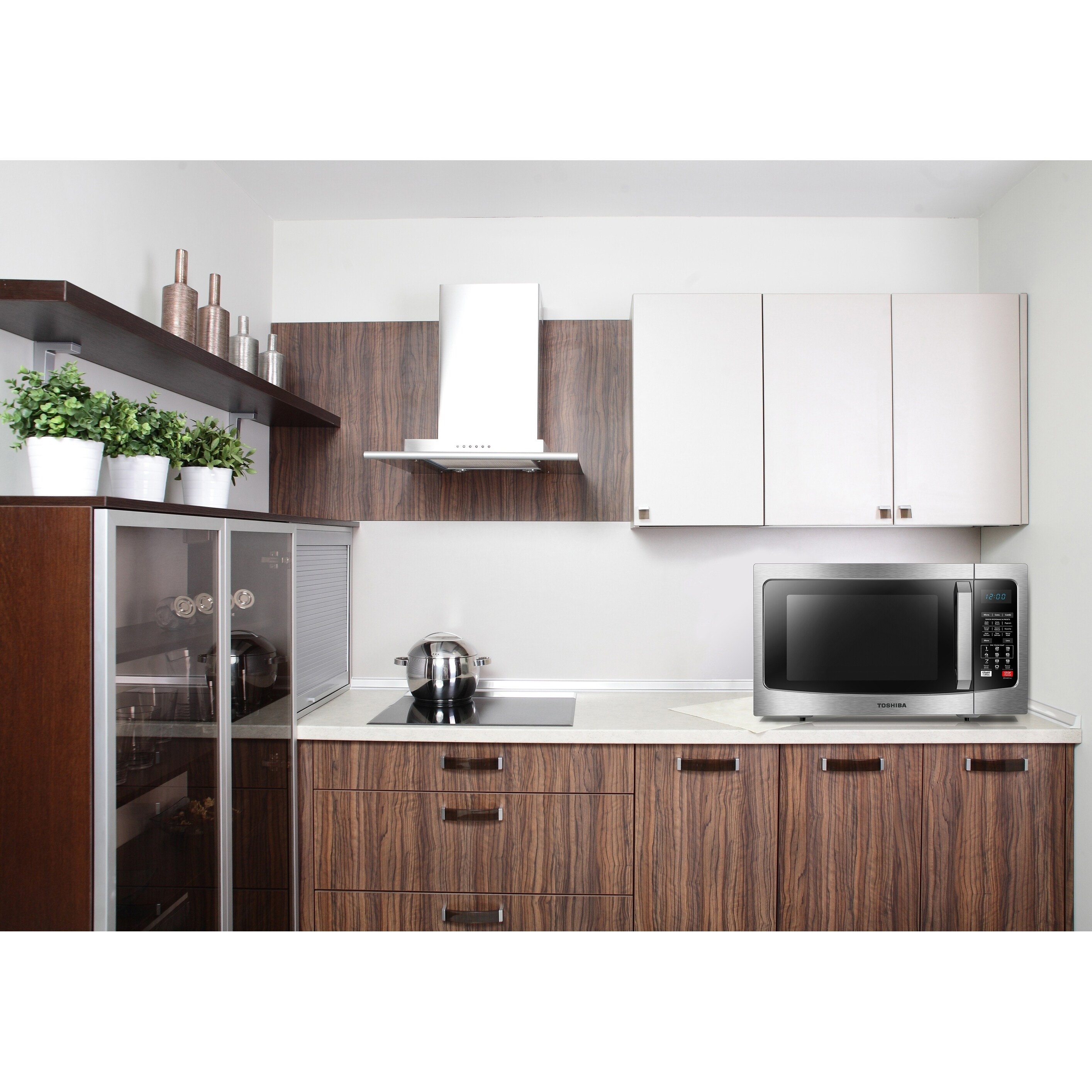 Toshiba 1.5-Cubic Foot Stainless Steel Convection Microwave - Bed