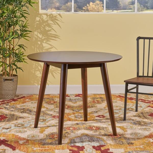 Shop Wynonna Mid Century Modern Round Faux Wood Dining Table
