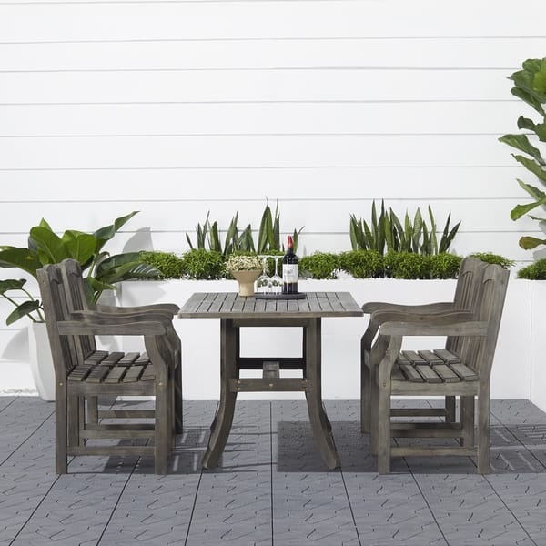 https://ak1.ostkcdn.com/images/products/22436211/Havenside-Home-Surfside-Rectangular-Table-and-Armchair-5-piece-Hardwood-Outdoor-Dining-Set-6ec4bd8c-9c67-49cb-8d42-4755e46e243c_600.jpg?impolicy=medium