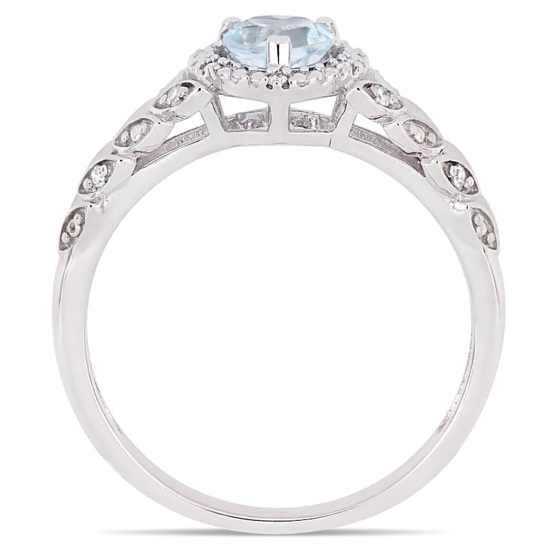 Miadora 10k White Gold Sky-Blue Topaz and Diamond Accent Heart Halo Engagement Ring