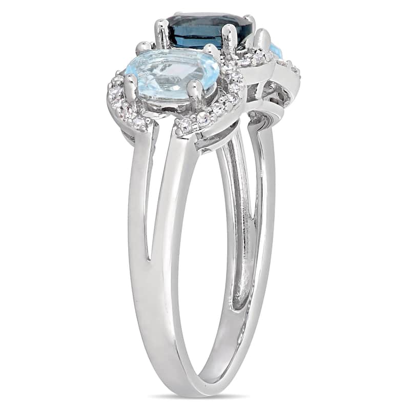 Miadora Sterling Silver London and Sky-Blue Topaz with 1/5ct TDW Diamond 3-Stone Halo Ring