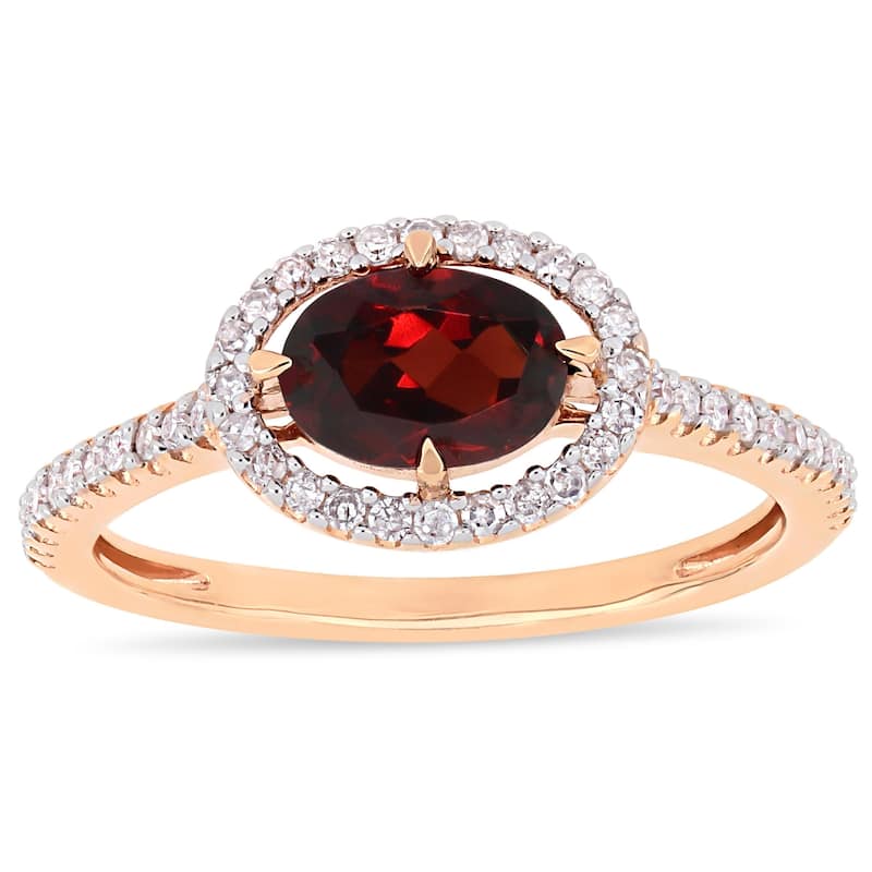Miadora 10k Rose Gold Garnet and 1/4ct TDW Diamond Floating Oval Halo Ring