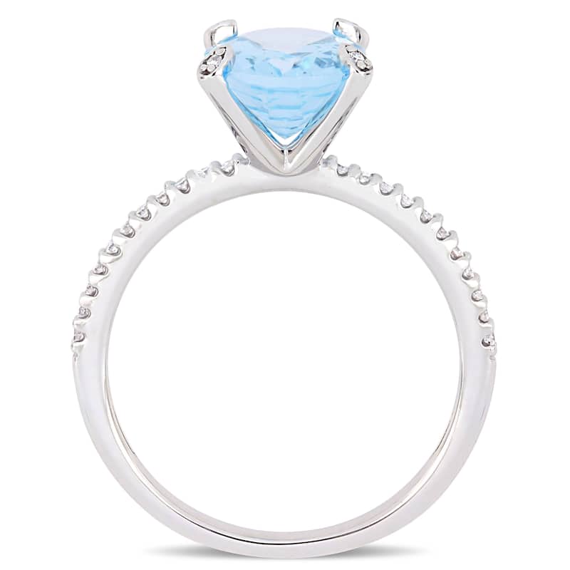 Miadora 10k White Gold Oval-Cut Sky-Blue Topaz and 1/10ct TDW Diamond Solitaire Ring