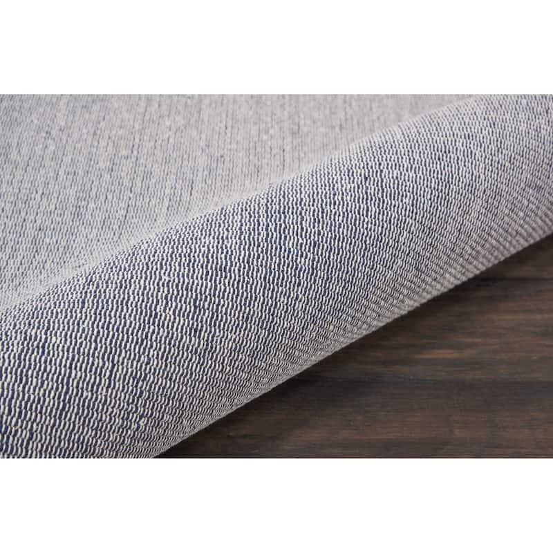 Nourison Otto Solid Tassel Area Rug