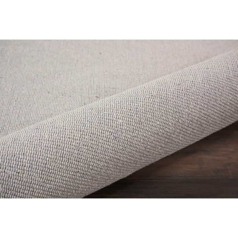 Nourison Otto Solid Tassel Area Rug