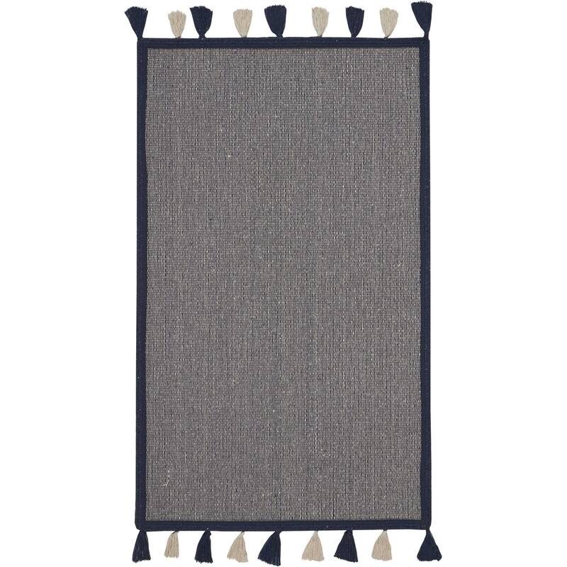 Nourison Otto Solid Tassel Area Rug