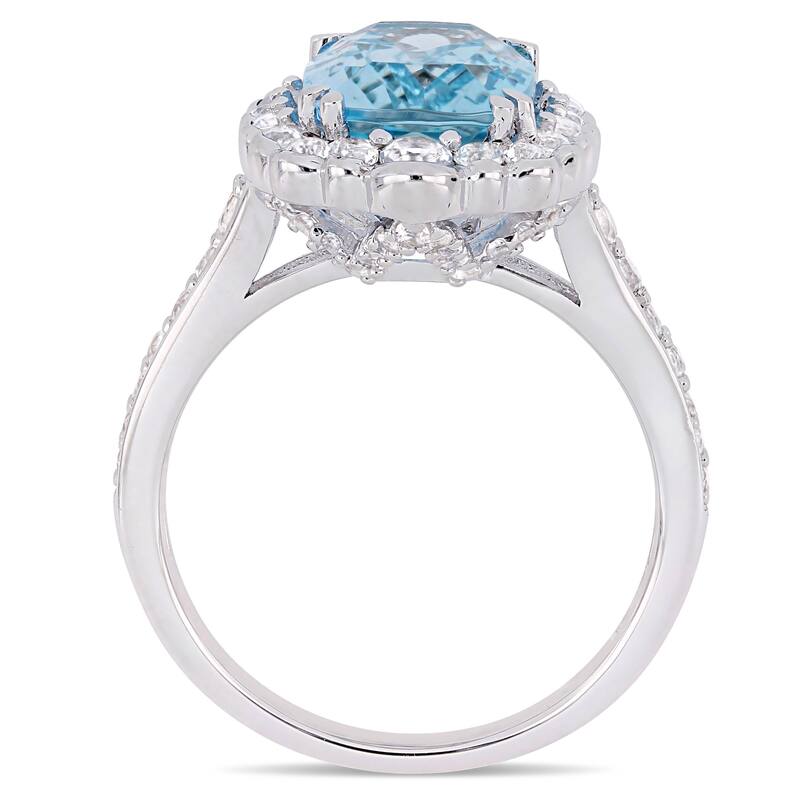 Miadora Sterling Silver Sky-Blue and White Topaz Halo Cocktail Ring
