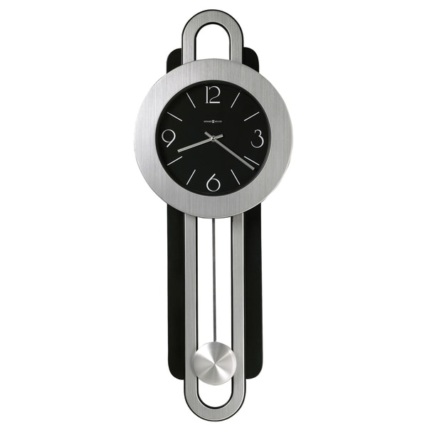 Howard Miller Gwyneth Wall Clock with Pendulum - 33 in. high x 12.5 in. wide x 3 in. deep. Opens flyout.