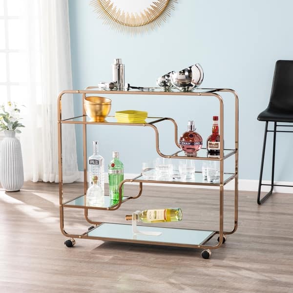 slide 2 of 13, SEI Furniture Stovring Champagne Gold Mirrored Bar Cart