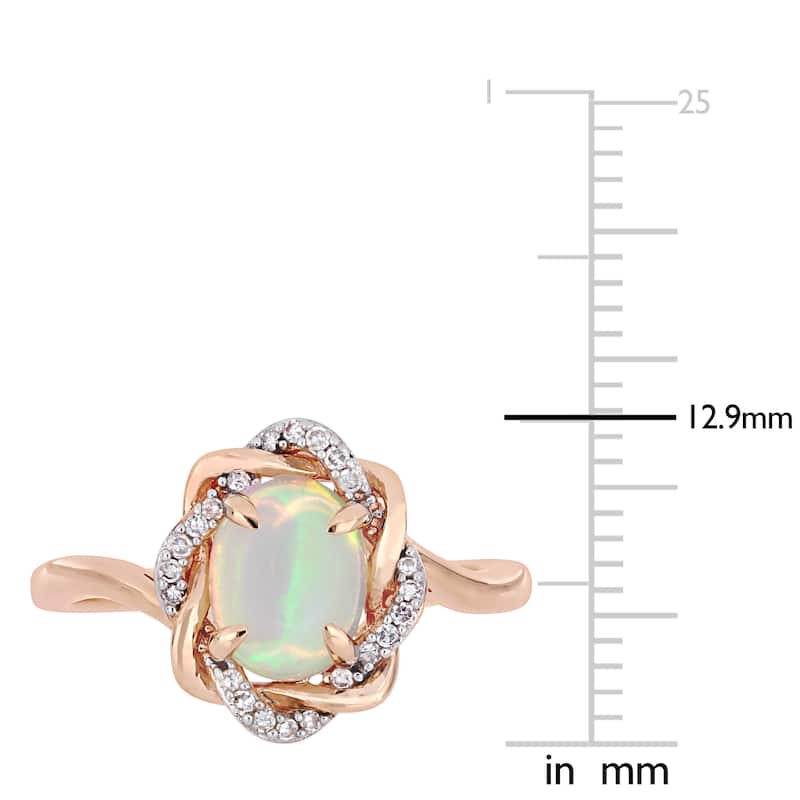 Miadora 10k Rose Gold Blue Ethiopian Opal and 1/10ct TDW Diamond Ring