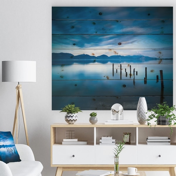 Designart 'Blue Lake with Wooden Pier' Landscape Photography Print on Natural Pine Wood - Blue