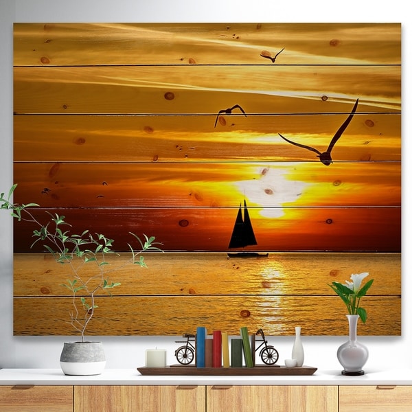 Designart 'Bright Yellow Beach with Birds' Seashore Print on Natural Pine Wood - Blue
