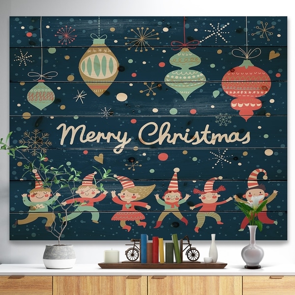 Designart 'Merry Christmas Dancing Elf Children and Snow Flakes' Print on Natural Pine Wood - Blue