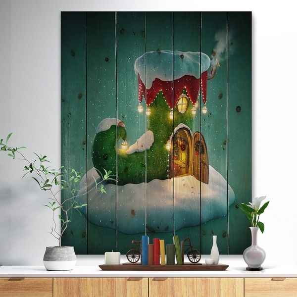 Designart 'Elf Shoe House on Snow Christmas Island' Print on Natural Pine Wood - Green