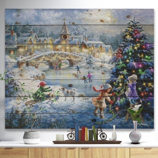 Designart 'Christmas tree decorating sledding children' Print on Natural Pine Wood - Blue