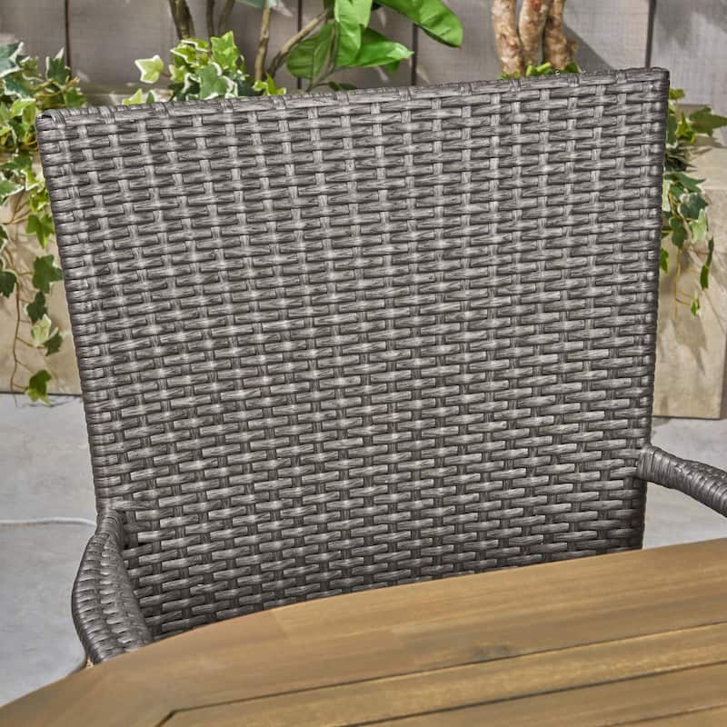 Elderon Outdoor 7 Piece Acacia Wood Dining Set with Stacking Wicker Chairs by Christopher Knight Home