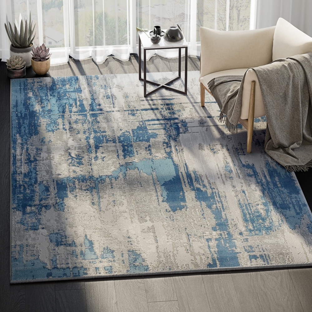 https://ak1.ostkcdn.com/images/products/23137053/Vista-Contemporary-Blue-Grey-Abstract-Indoor-Rug-53-X-76-94c9c28f-a381-419c-a3ac-74d08c7c2af3_1000.jpg